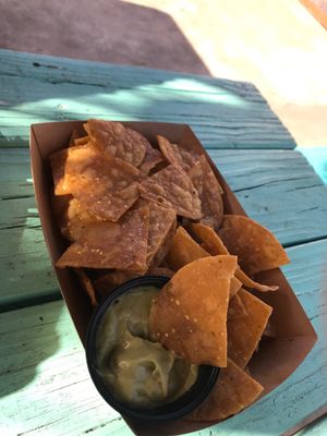 Chips with a side guac at Nissi Vegan in Austin