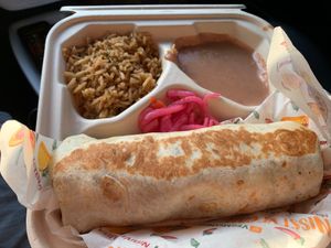 Burrito plate with carne asada. Pretty delicious  at Nissi Vegan in Austin