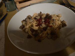 Tagliatelle con melanzane e pomodori secchi  at Country Relais Coroncina in Belforte Del Chienti