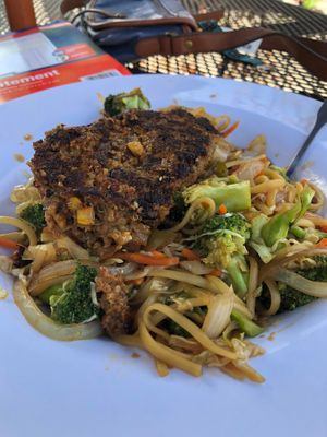 Veggie lo mein topped with a homemade quinoa/ veg burger. Ridiculously delicious!  at Phat Boyz Wings & Sports Bar in Plymouth