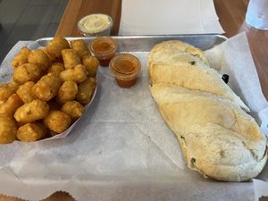 Flavor bomb pho dip and tots  at St. Veg in Rockville