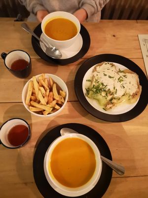Garlic fries, pumpkin soup and eggplant with tahini and lemon at The Open Kitchen in Monteverde