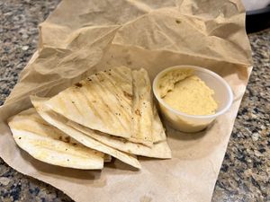 Pita and freshly made hummus   at Alkalicious Cold Pressed Juice Bar in Chesapeake