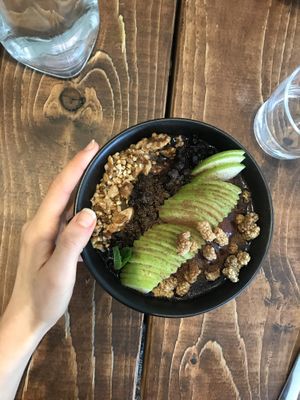 Smoothie bowl with walnuts, apples and mulberries at A.VO.KA.DO in Malmo