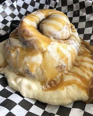 Cinnamon roll with Cream cheese frosting and caramel sauce 100% vegan! at Cinnaholic  in Knoxville