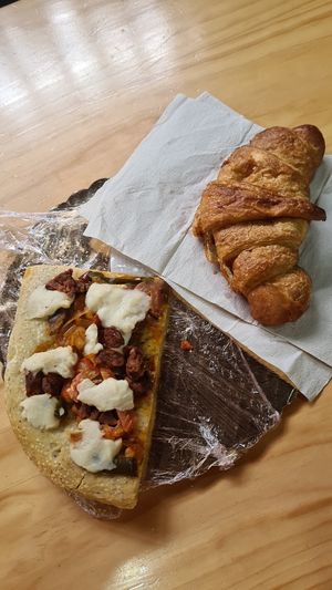 Vegan pizza and choco Croissant at Rios Vegan Food in Puerto Viejo De Talamanca