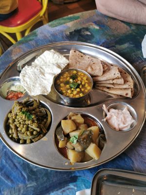 Three different curries with roti at Delhish in Oxford