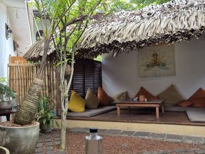 Don't recommend to sit there since it is besides the trash bins and smells awful at Salty Swami's in Hikkaduwa