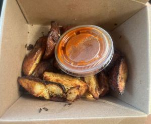 Potato wedges with homemade ketchup   at Melt Revival in Cincinnati