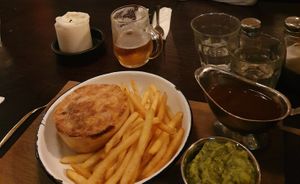 Vegan pie, with pea pure and vegan gravy at Pieminister in Sheffield