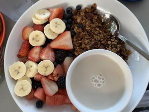 Breakfast option: Granola + fruits + almond milk 😋 at Moondog in Key West