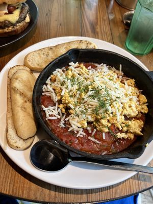 Vegan shakahyka with tofu and vegan cheese  at Moondog in Key West