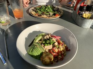Ahi Tuna Poke:  
edamame, cucumber, pineapple salsa, wasabi-soy-ginger sauce, avocado, scallions, toasted sesame seeds & tofu at Moondog in Key West