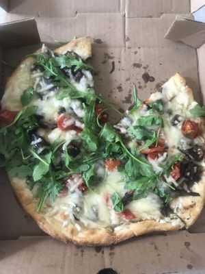 Mushroom, vegan cheese, arugula pizza. SO Delicious?  at Moondog in Key West