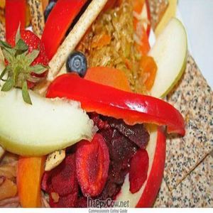Antipasti plate with red cabbage, fruit, vegetables, crackers, dip and grissini. 
 at Lei e Lui in Berlin