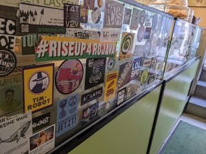 Stickers inside the restaurant. at Tutti Island in Berlin