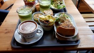 Plateau complet (Mocaccino avec lait d'amande, jus frais, houmous, tapioca/coco bowl et quiche vegan) at Le Café Potager in Strasbourg