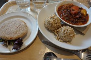 Pita bread (left), Mexican Chili beans with brown rice. at The Happy Pear in Greystones