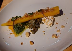 Carrots, caramelized walnuts, almond ricotta, fermented mushroom tapenade, sunflower seed pesto at Magu in Helsinki