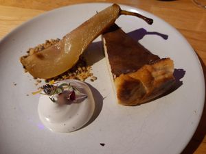 Basque cheesecake, maple roasted pear, hemp crumble and cardamom meringue at Magu in Helsinki