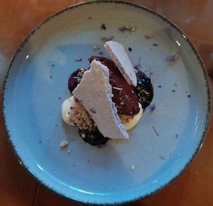 Wild blueberry, hazelnut, juniper berry, vanille meringue & fireweed flowers at Magu in Helsinki
