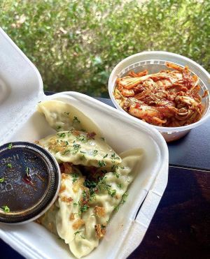 Veggie dumplings and kimchi   at Cris and John in Dallas
