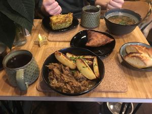 Sauerkraut stew, vegan quiche, mushroom soup and samosa.  at The Purple Carrot in Malton
