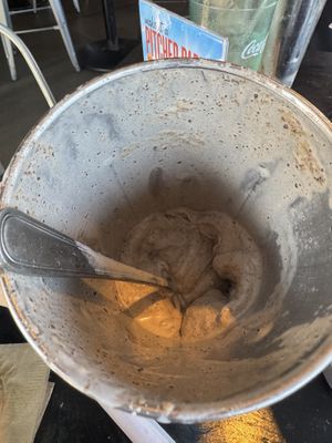 When you order a 10 ounce milkshake, they bring you 8 ounces of it in a glass cup and the remaining in this container    at Burgatory - McHolme Dr in Pittsburgh