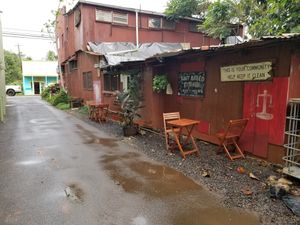 Window orders taken in alleyway at The Cosmic Kitchen in Haleiwa