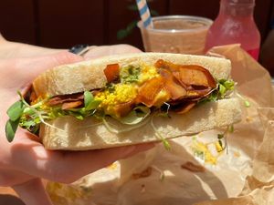 Breakfast sandwich with crispy coconut bacon at The Cosmic Kitchen in Haleiwa