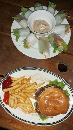 Burger and fresh spring rolls at Veggie Box in Phong Nha