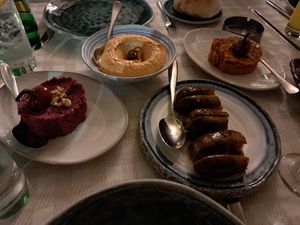 Eggplant yalanji, beetroot appetizer and humus with red pepper at Levant in Amman