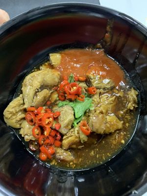 Mock meat in a thick brown sauce, add Chile spices to taste. Truly delish  at Green Bliss Habitat 綠福苑 - Fortune Centre in Central Singapore