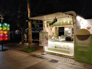 Kiosk background is Marina Bay Sands at Co+Nut+Ink - Esplanade in Central Singapore