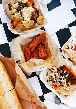 Sloppy Joe tots, Buffalo wings, buffalo chicken tacos, Italian sandwich.  at The BE-Hive in Nashville