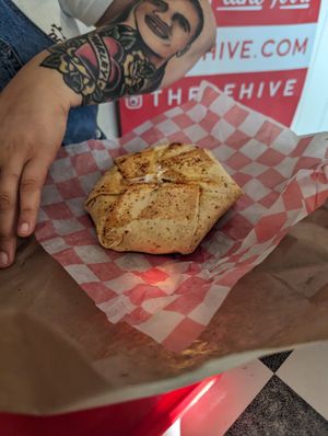 Pizza crunchwrap at The BE-Hive in Nashville