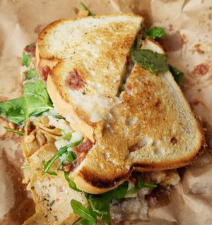 ThanksLiving special The Leftover Sandwich (seasoned slices, mashed potatoes with gravy, cranberry mustard and dress greens.) at The BE-Hive in Nashville