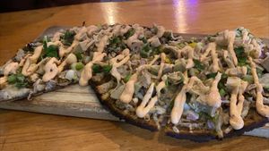 Amazing, delicious, healthy, and unique vegan pizza at Vegan Cave at Vegan Cave Tanoor Pizza in Vancouver