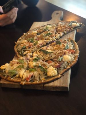 Freaky Greeky (subbed sausage for olives) at Vegan Cave Tanoor Pizza in Vancouver