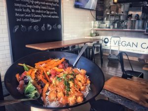 bombay bad boy bowl - spiced right and colourful means you’re getting a balance of all the right vitamins and minerals !  at Vegan Cave Tanoor Pizza in Vancouver