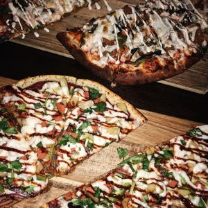 Buddha on the Beach and Samsara Sausage at Vegan Cave Tanoor Pizza in Vancouver