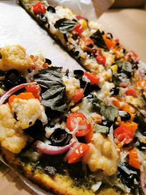 Freaky Greeky with Almond Crust at Vegan Cave Tanoor Pizza in Vancouver