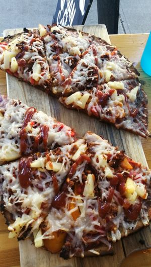 Buddha on the beach at Vegan Cave Tanoor Pizza in Vancouver