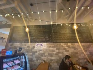 Hard to read but just look at all the options! at Vegan Cave Tanoor Pizza in Vancouver