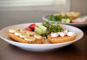 Big Island Creamery mac nut cream cheese on a bagel.  at Kamuela Farmers Market in Waimea