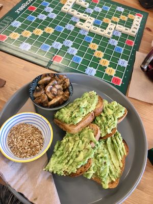 Avo toast with a side of scrabble! at Fuzzy Wombat's Kitchen in Port Noarlunga