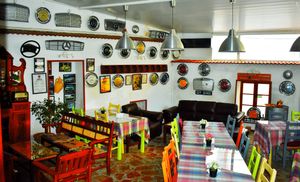 Our delightful dining area is adorned with quirky images of the past, antiques and memorabilia... at Gazan in Kyrenia