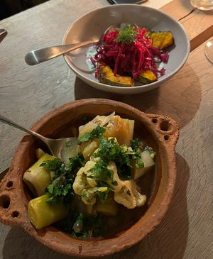 Braised leeks and cauliflower and roasted squash with vegan mint yoghurt and pickled red cabbage   at Rafikis in Ashburton