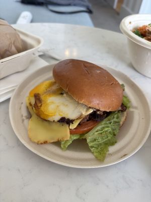 sunrise burger with brioche instead of pretzel bun   at Veggie Grill by Next Level - UCLA Ackerman Union in West Los Angeles