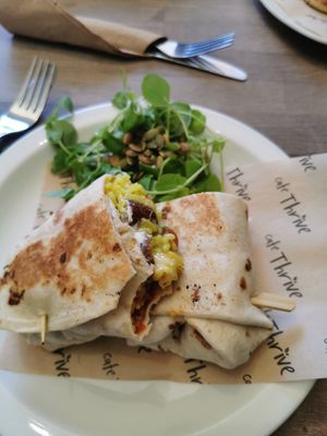 Sausage burrito (I bit into it to excited before taking a photo lol) at Cafe Thrive in Bournemouth
